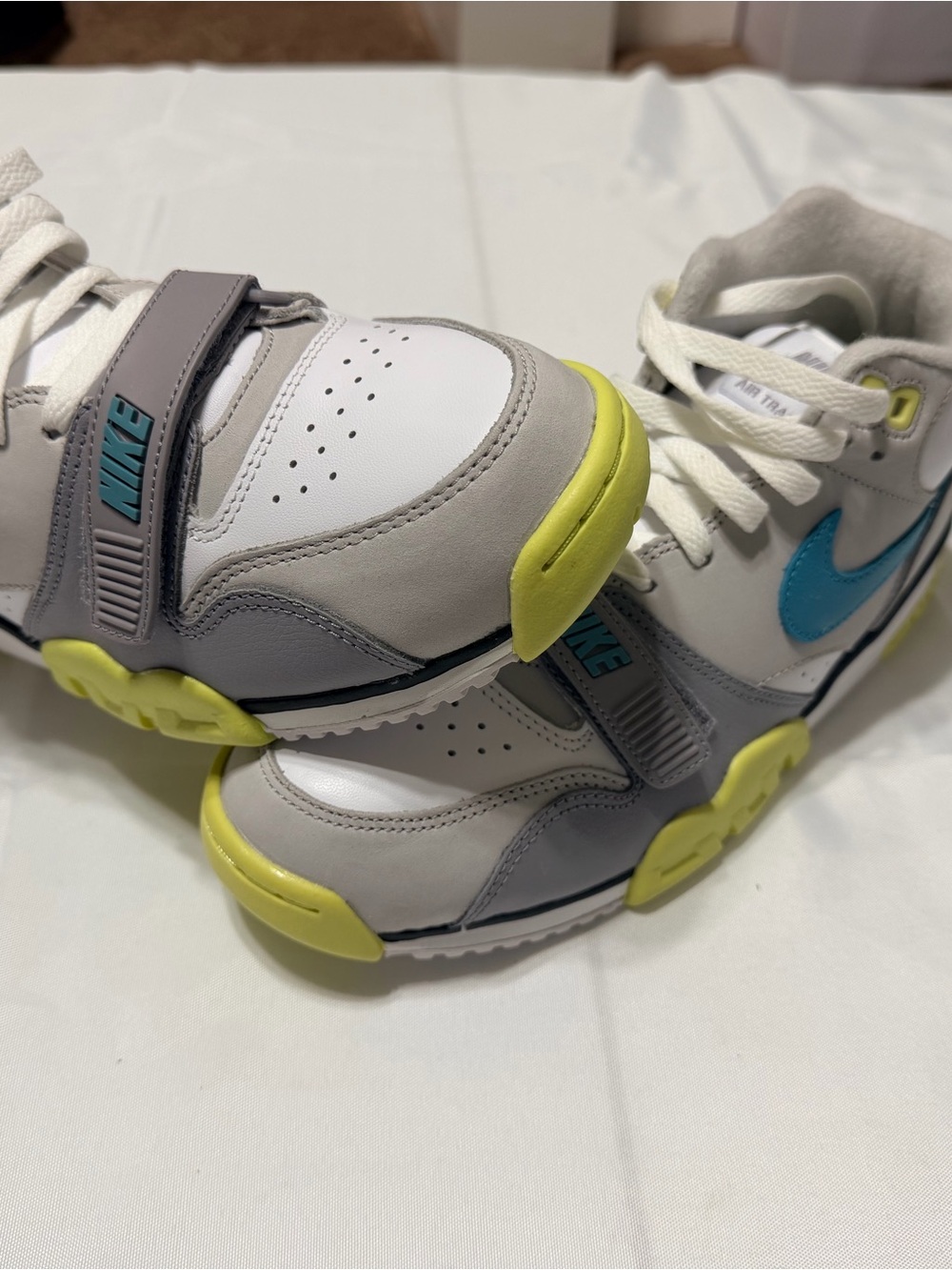 Nike Kids White, Gray & Yellow Sneakers with Blue Swoosh